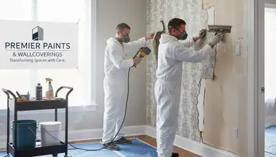 Chattanooga, TN painters carefully removing wallpaper and prepping walls for painting